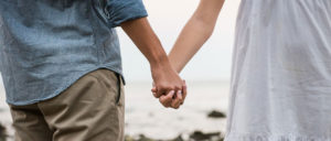 mixed couple holding hands